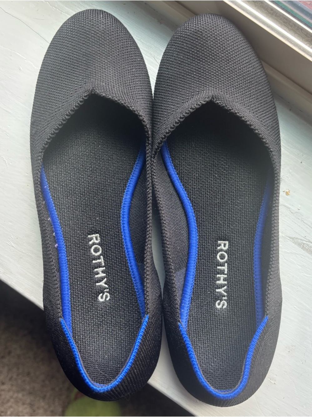 Rothy's Black Ballet Flats with Blue Trim